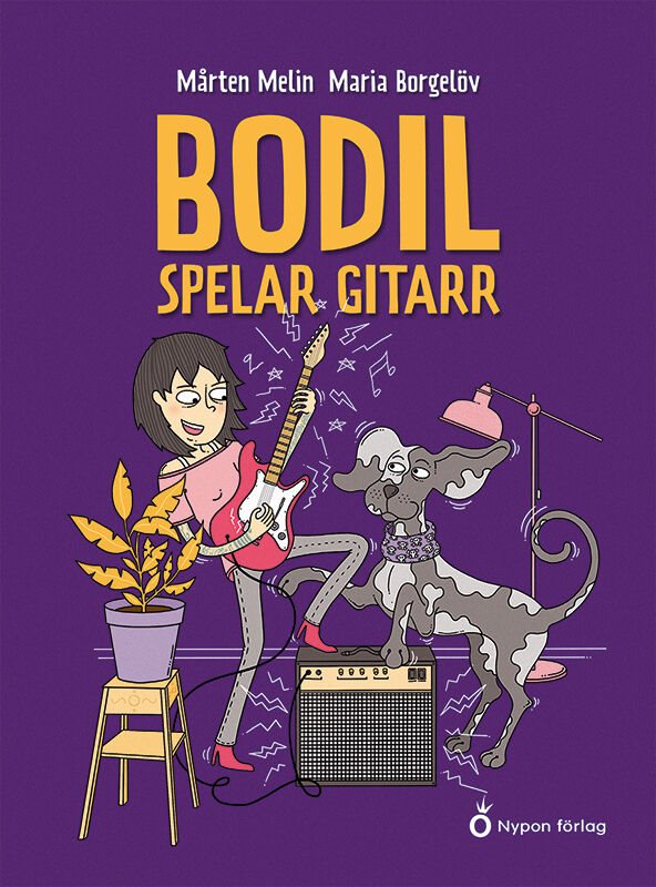 Bodil spelar gitarr